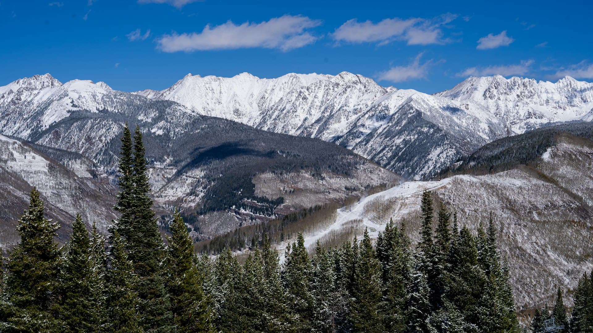 Snow-capped mountain peaks at golden hour
